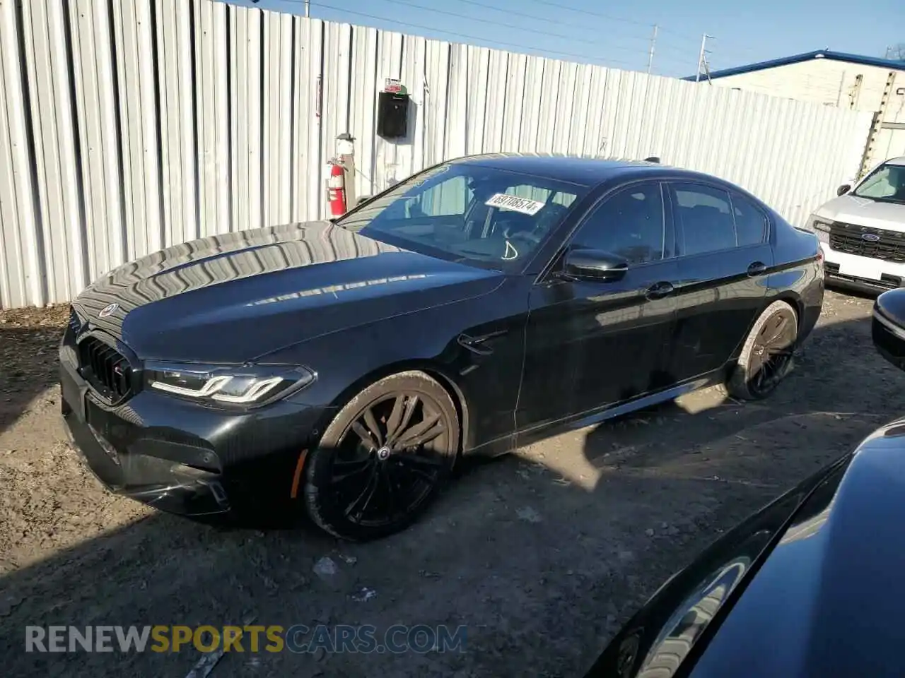 1 Photograph of a damaged car WBS83CH07PCL16321 BMW M5 2023