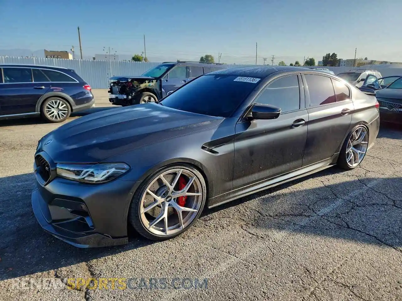 1 Photograph of a damaged car WBS83CH07PCN39703 BMW M5 2023