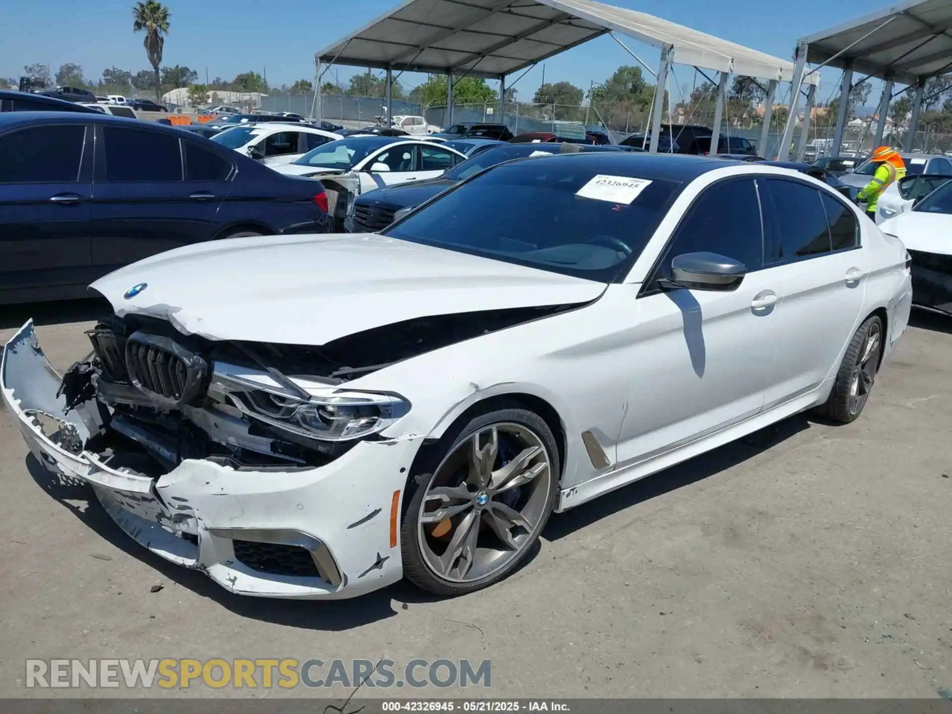 2 fotografías del automóvil dañado WBAJS7C0XLCD42738 BMW M550I 2020