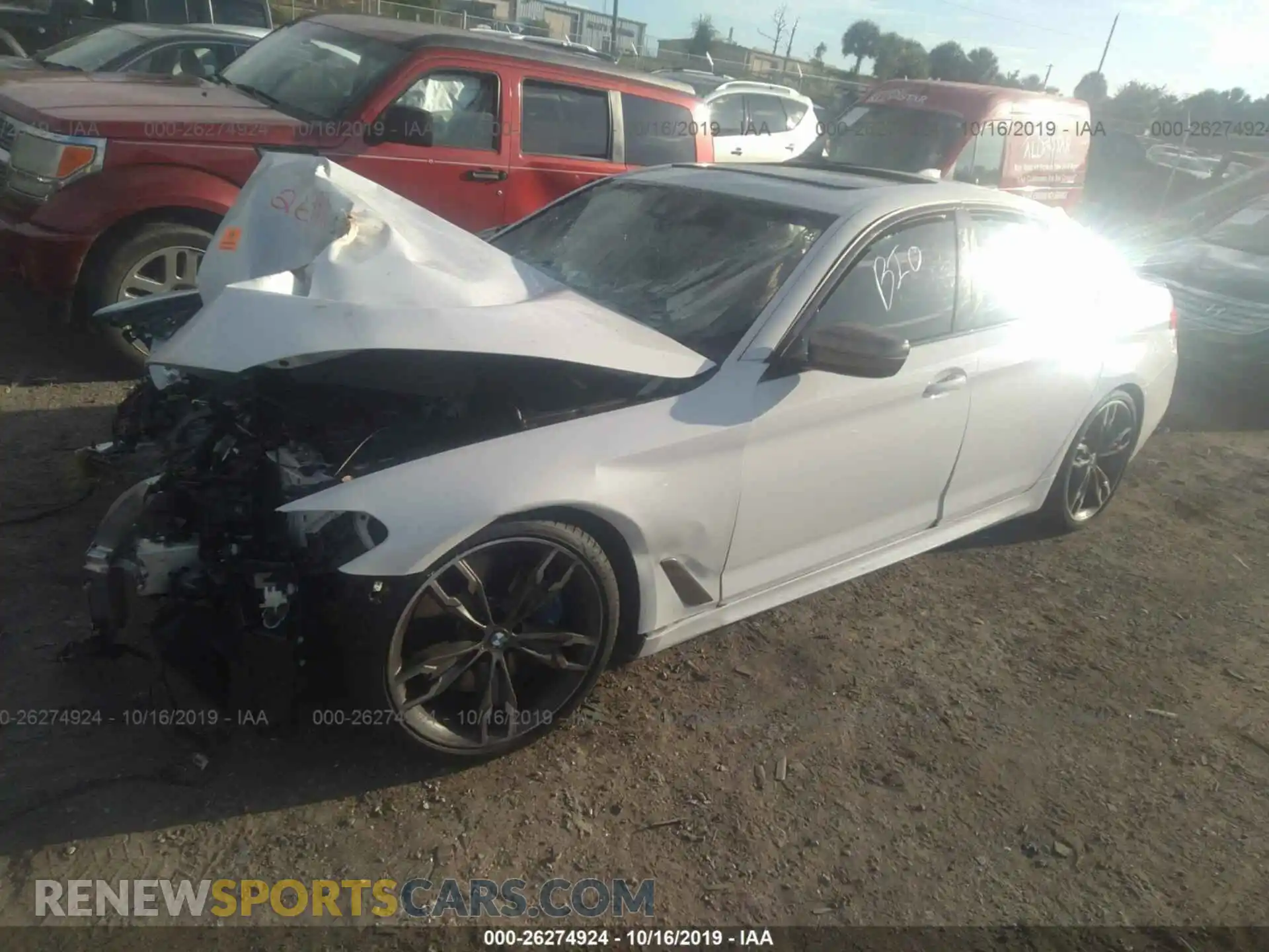 2 Photograph of a damaged car WBAJB9C55KB289441 BMW M550XI 2019