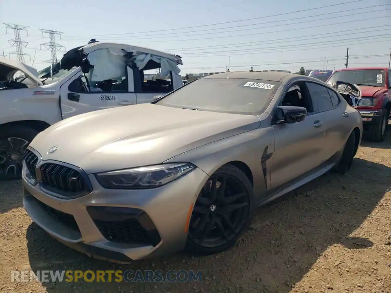 1 Photograph of a damaged car WBSGV0C01MCF26925 BMW M8 2021