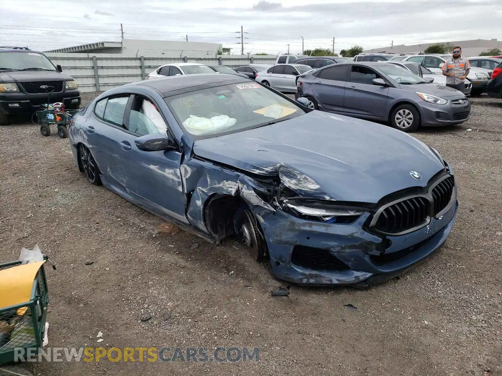 1 Photograph of a damaged car WBAGV8C01NCH15286 BMW M8 2022