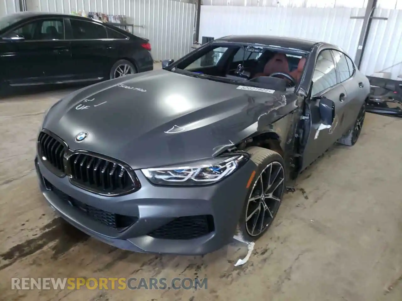 2 Photograph of a damaged car WBAGV8C01NCH89498 BMW M8 2022