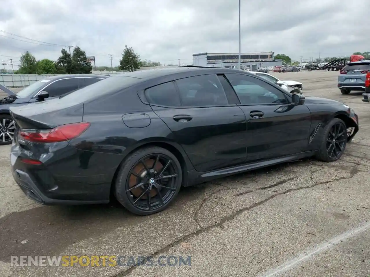 3 Photograph of a damaged car WBAGV8C02NCK08667 BMW M8 2022