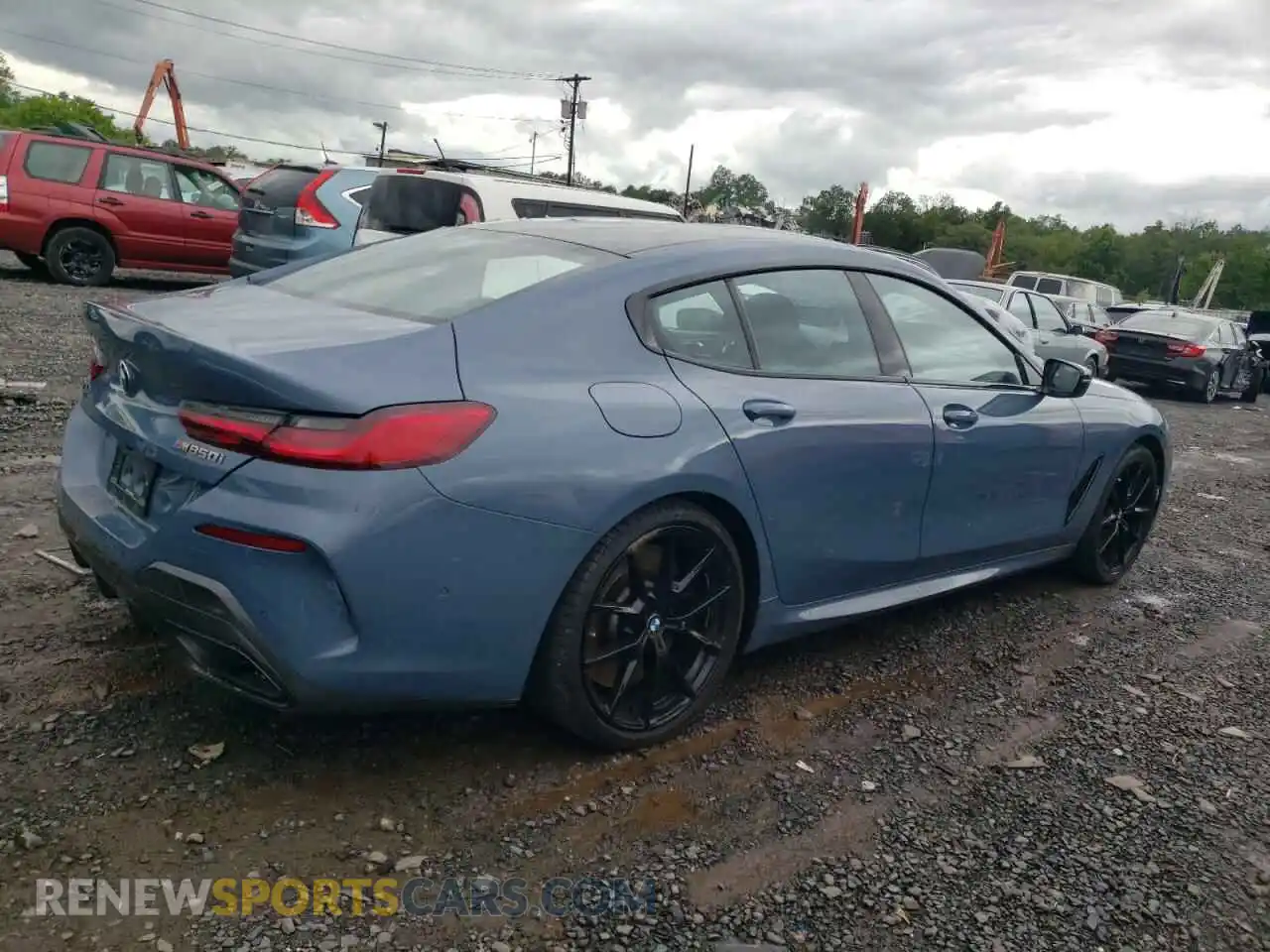 3 Photograph of a damaged car WBAGV8C07NCH87786 BMW M8 2022