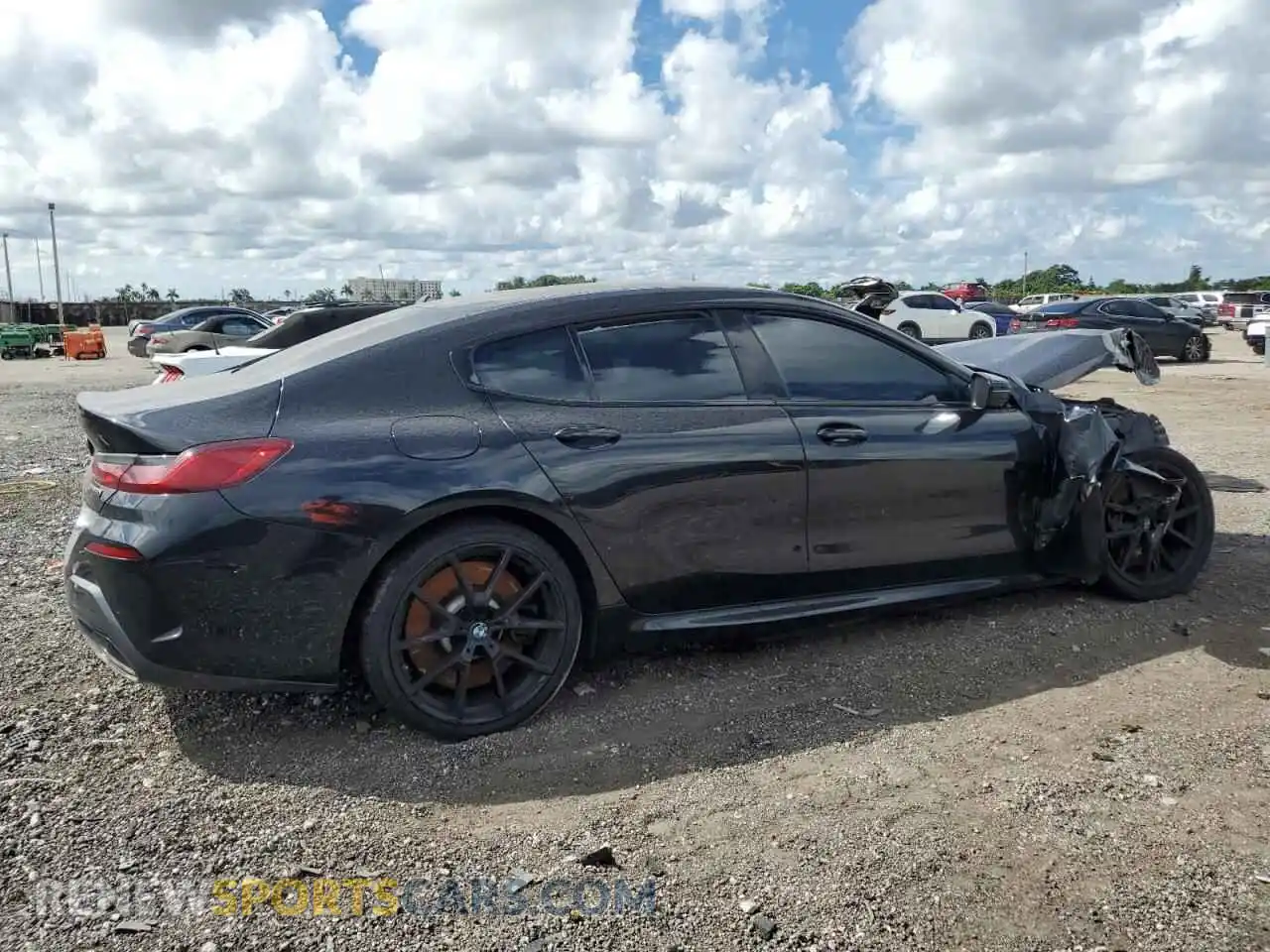 3 Photograph of a damaged car WBAGV8C09NCH96974 BMW M8 2022