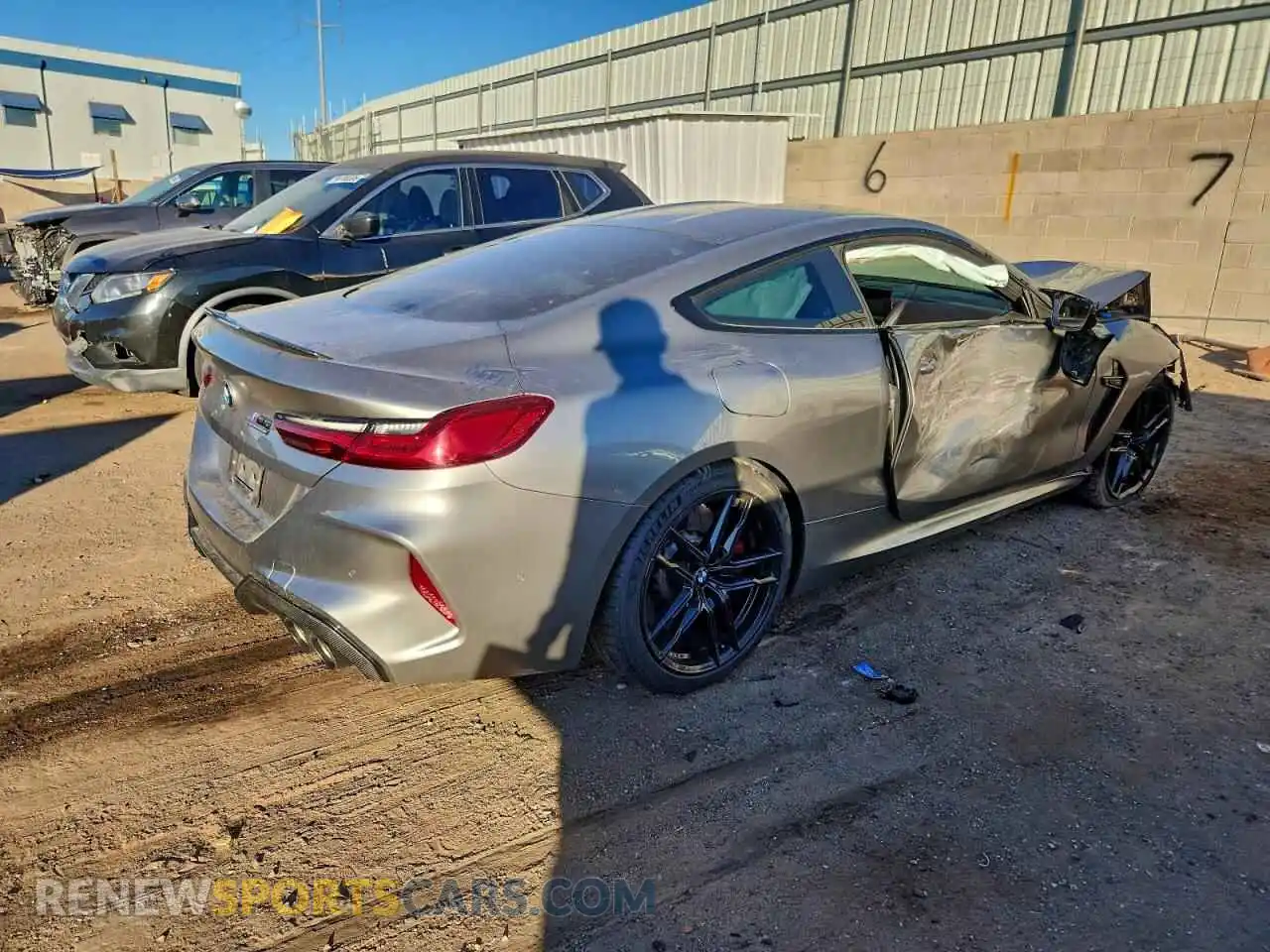 3 Photograph of a damaged car WBSAE0C08NCJ27773 BMW M8 2022