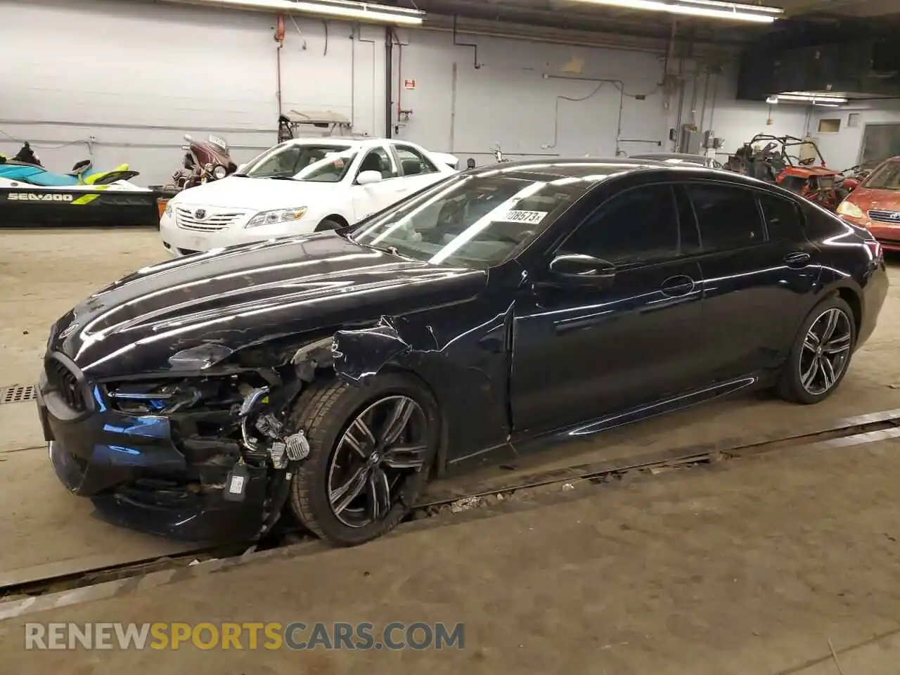 1 Photograph of a damaged car WBAGV8C02PCK62070 BMW M8 2023