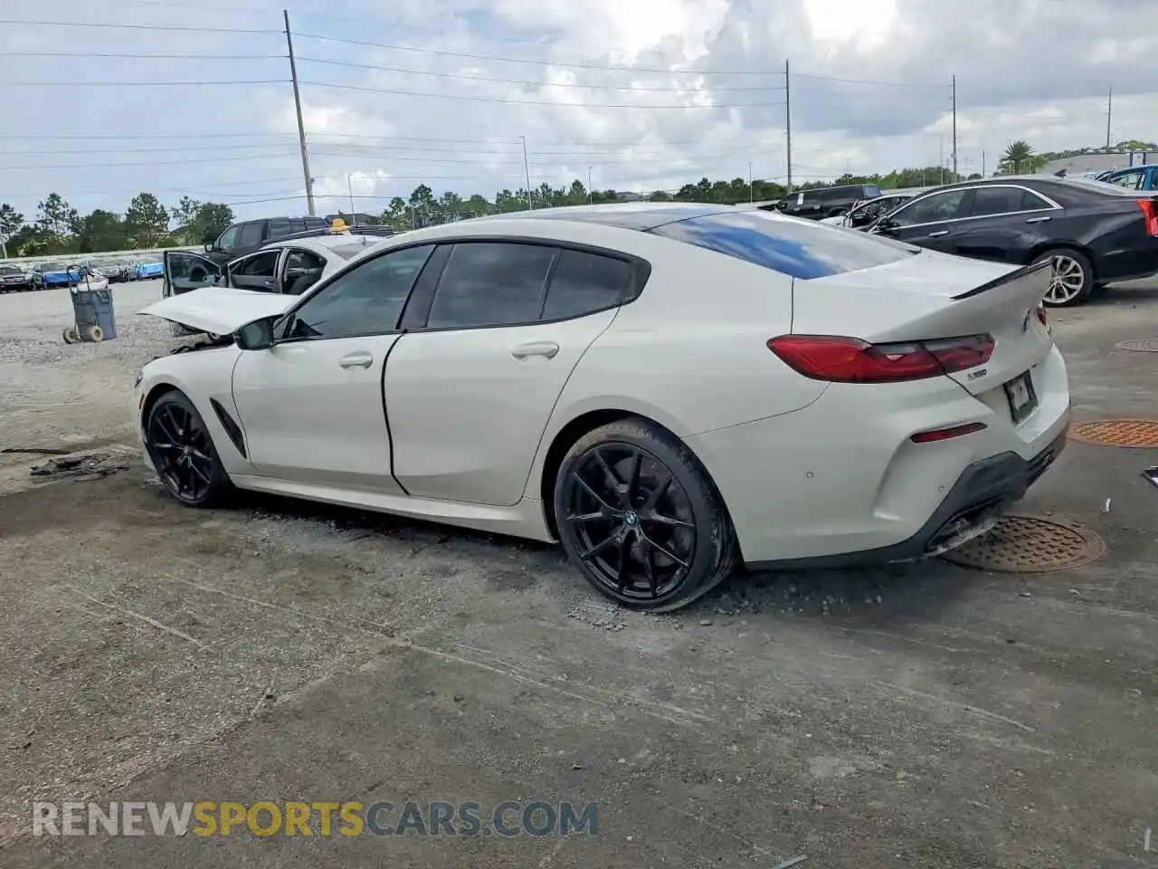 2 Photograph of a damaged car WBAGV8C07RCP11889 BMW M8 2024