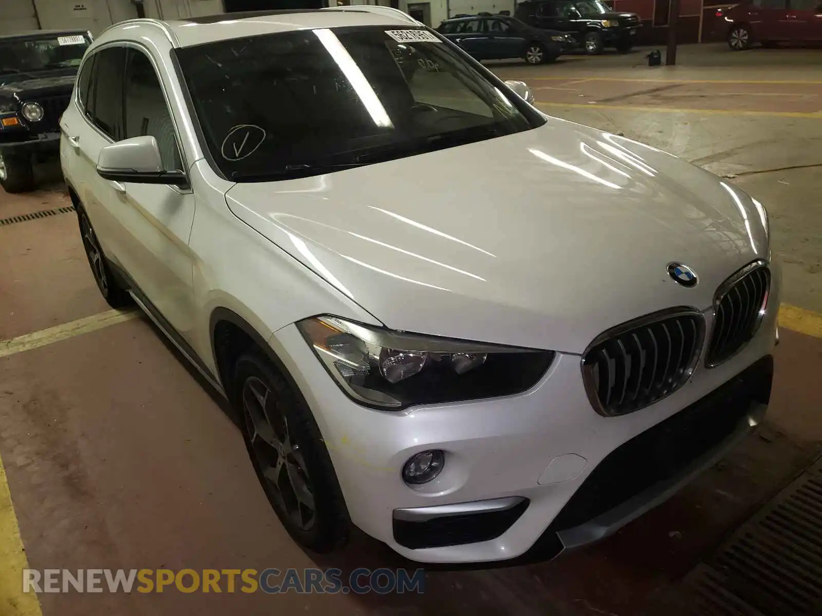 1 Photograph of a damaged car WBXHT3C57K5L35705 BMW X1 2019