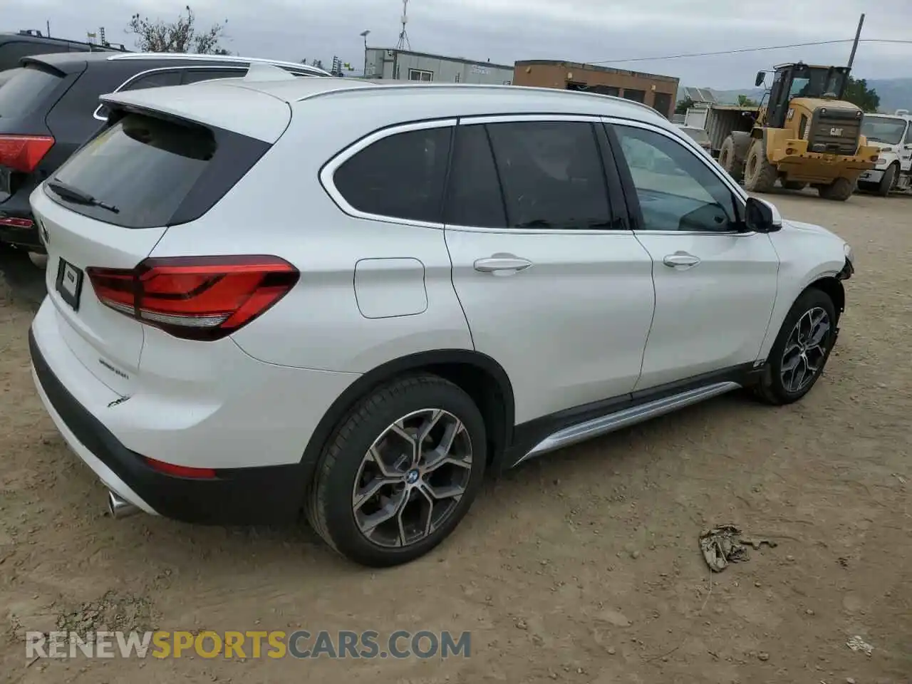 3 Photograph of a damaged car WBXJG7C09M5S33942 BMW X1 2021