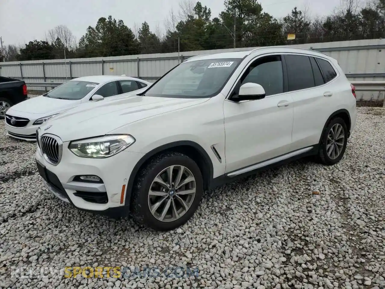 1 Photograph of a damaged car 5UXTR7C5XKLR52636 BMW X3 2019