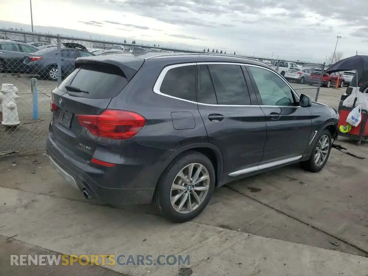 3 Photograph of a damaged car 5UXTR9C57KLE13213 BMW X3 2019