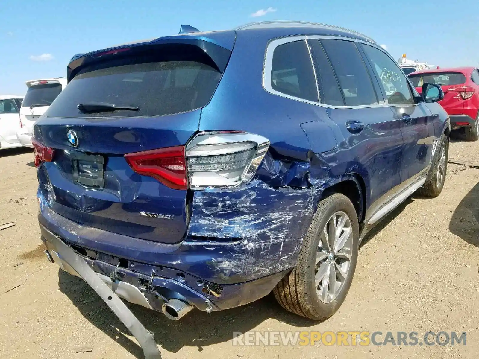 4 Photograph of a damaged car 5UXTR9C59KLP94379 BMW X3 2019
