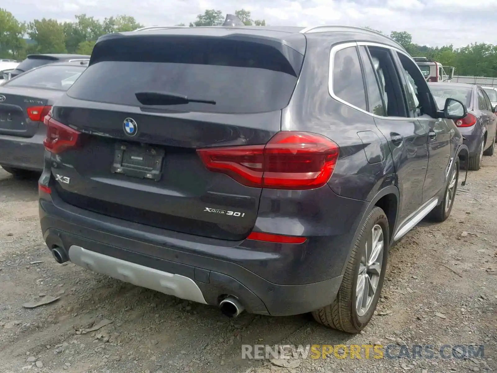 4 Photograph of a damaged car 5UXTR9C5XKLE21628 BMW X3 2019