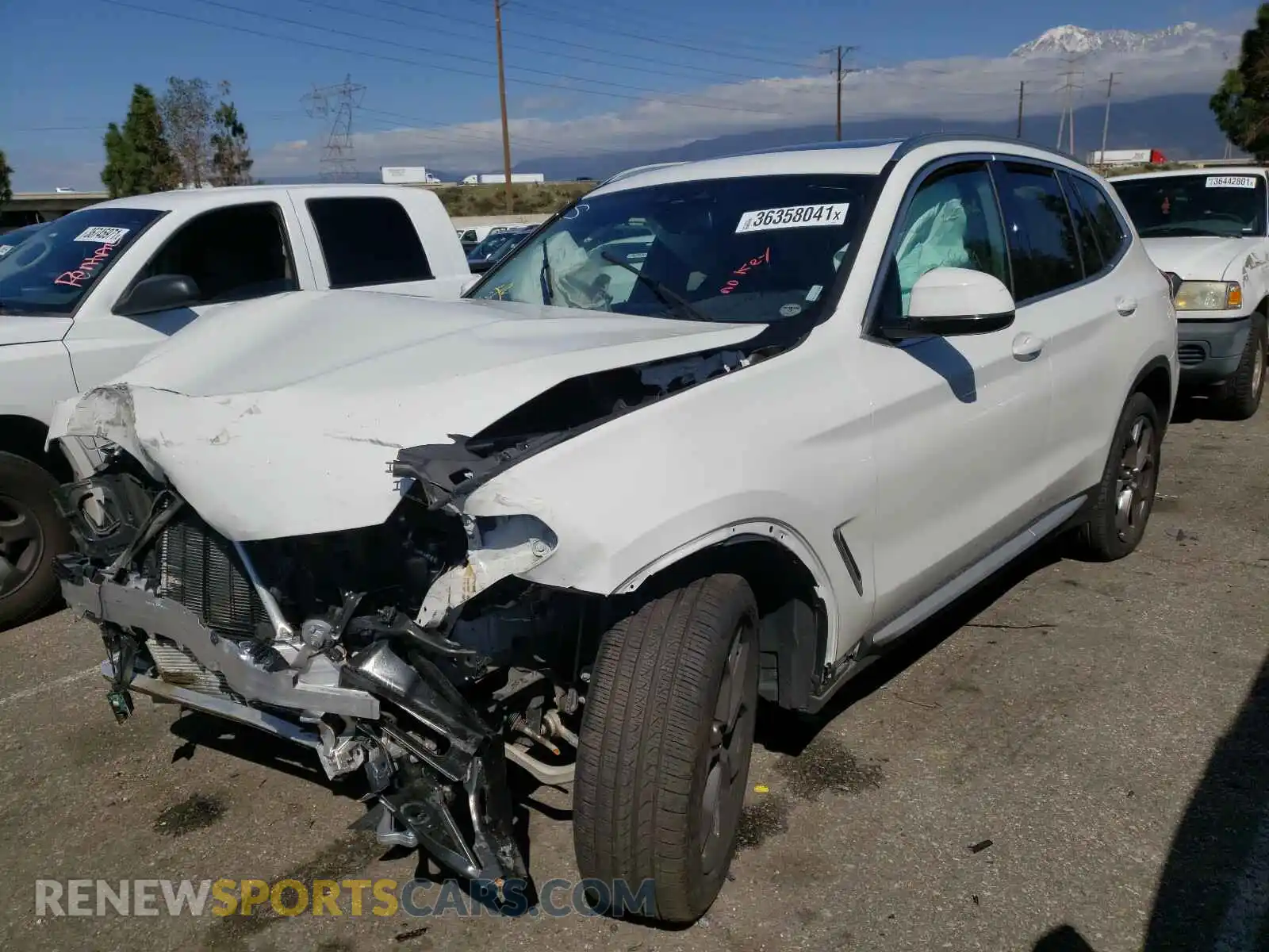 2 Photograph of a damaged car 5UXTY5C0XM9E37392 BMW X3 2021