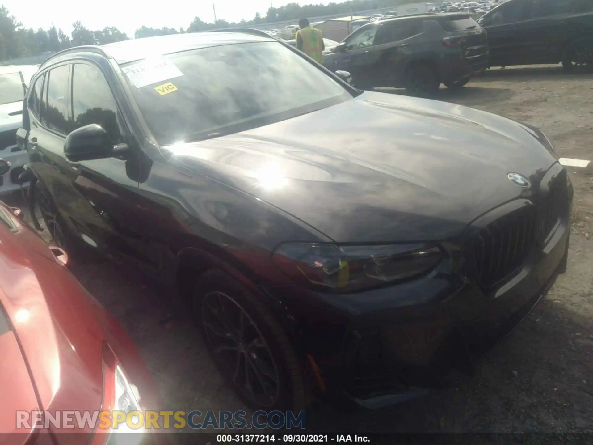 1 Photograph of a damaged car 5UX43DP00N9J26012 BMW X3 2022