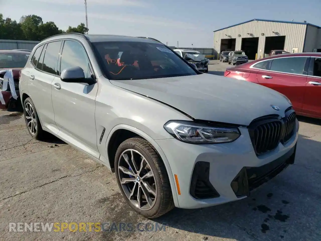 1 Photograph of a damaged car 5UX43DP01N9L67075 BMW X3 2022
