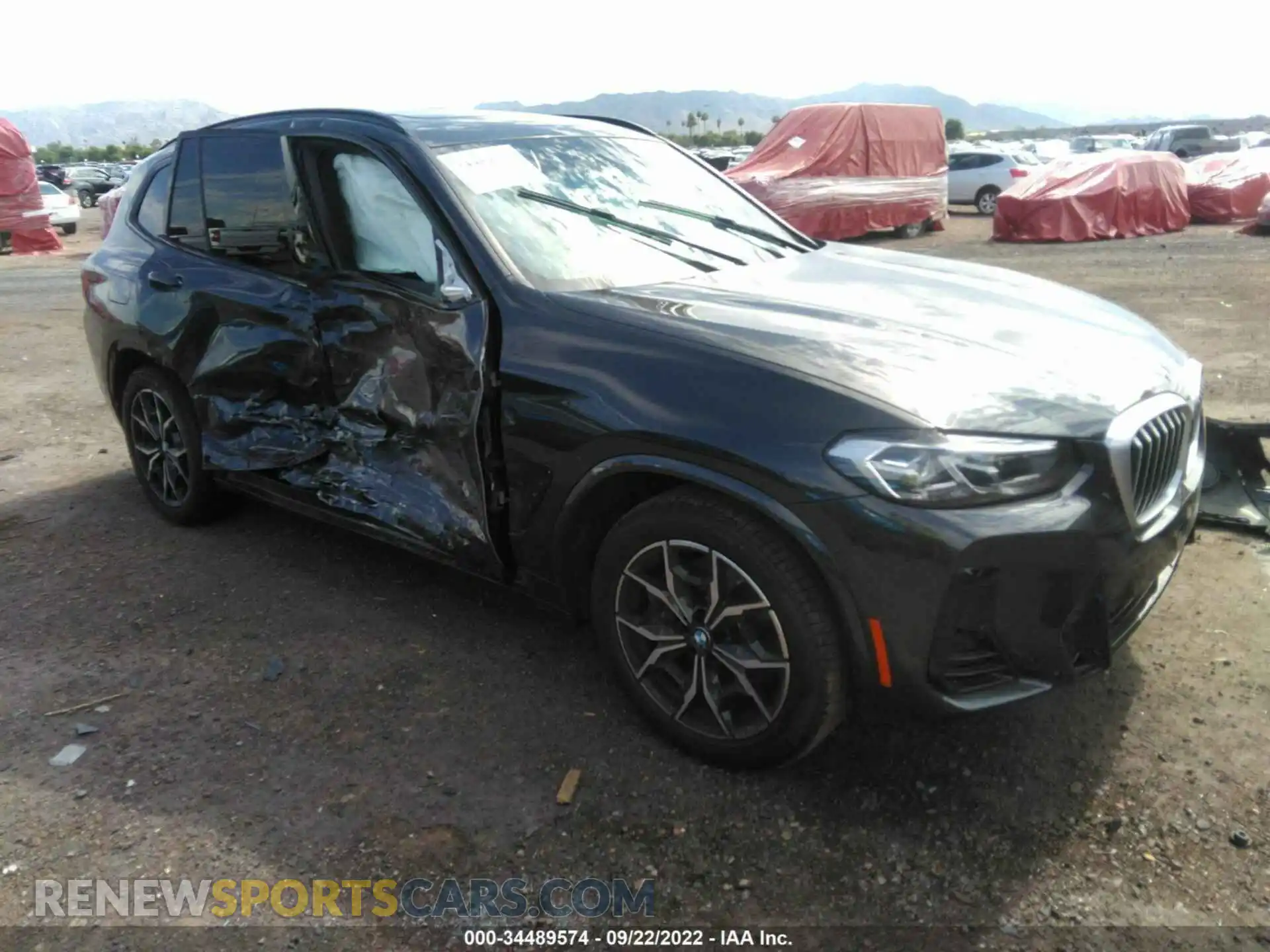 1 Photograph of a damaged car 5UX43DP01N9M26352 BMW X3 2022