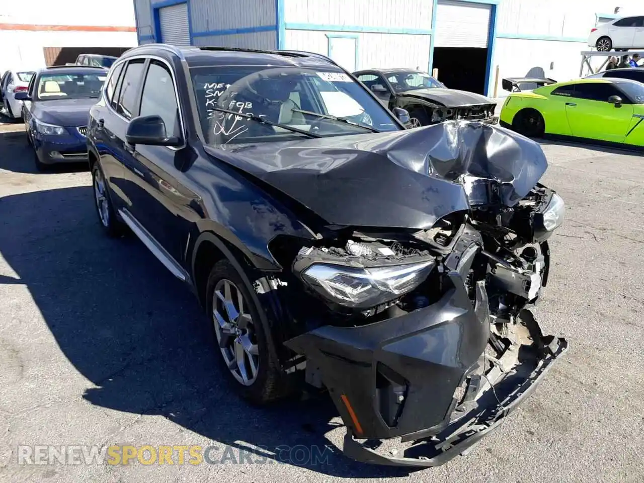 1 Photograph of a damaged car 5UX43DP03N9J78010 BMW X3 2022