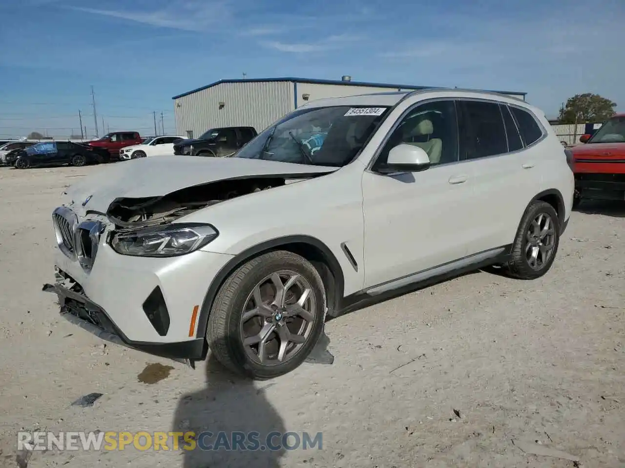 1 Photograph of a damaged car 5UX43DP03N9L84007 BMW X3 2022