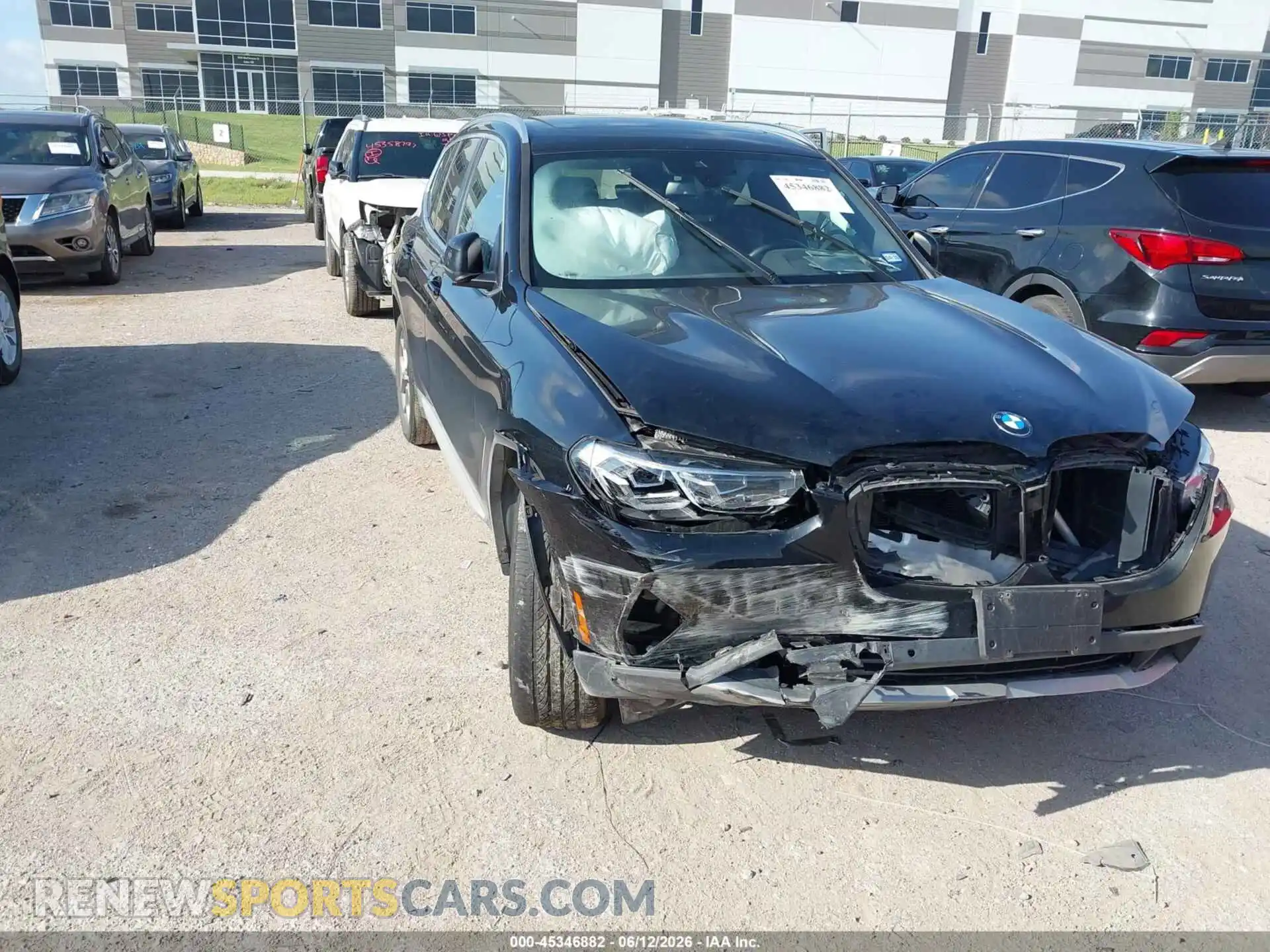 1 Photograph of a damaged car 5UX43DP04N9M44473 BMW X3 2022
