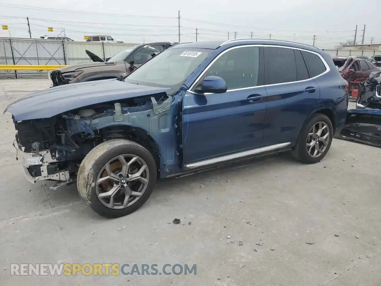 1 Photograph of a damaged car 5UX43DP05N9L42504 BMW X3 2022