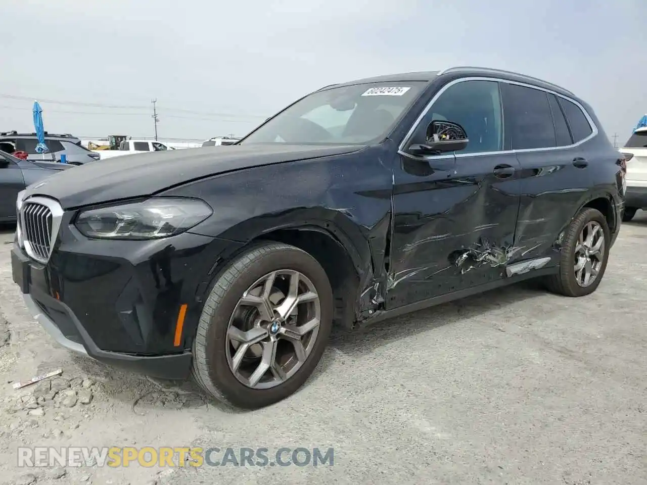 1 Photograph of a damaged car 5UX43DP06N9J24572 BMW X3 2022