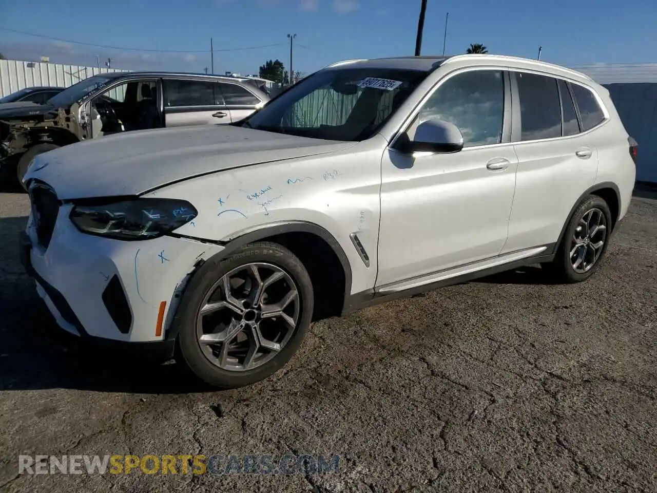 1 Photograph of a damaged car 5UX43DP06N9M30462 BMW X3 2022