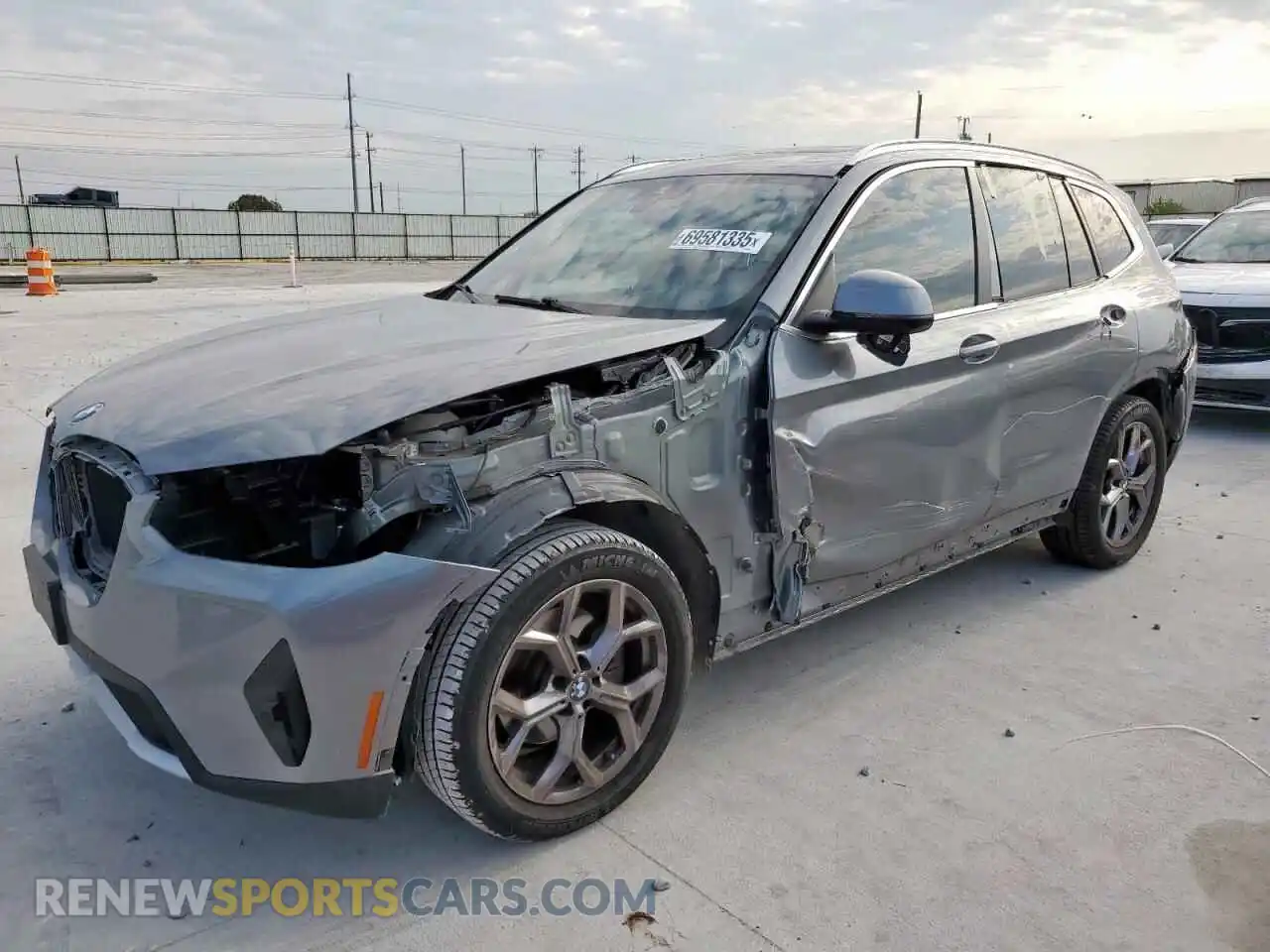 1 Photograph of a damaged car 5UX43DP09N9J96754 BMW X3 2022