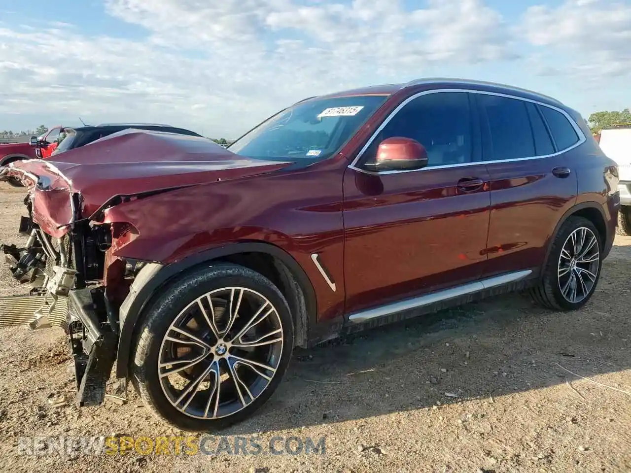 1 Photograph of a damaged car 5UX43DP09N9M55985 BMW X3 2022