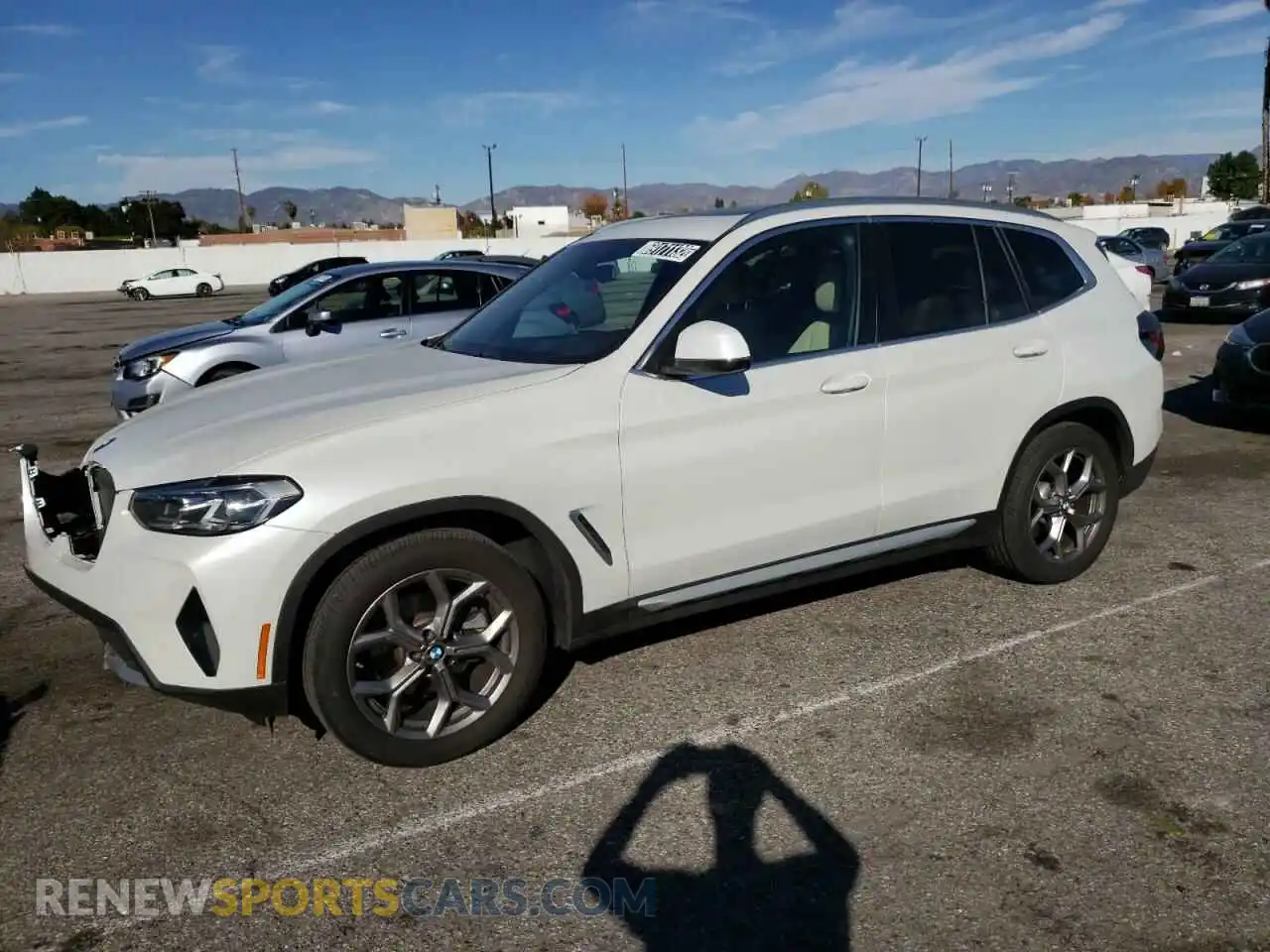 1 Photograph of a damaged car 5UX43DP09N9N22133 BMW X3 2022