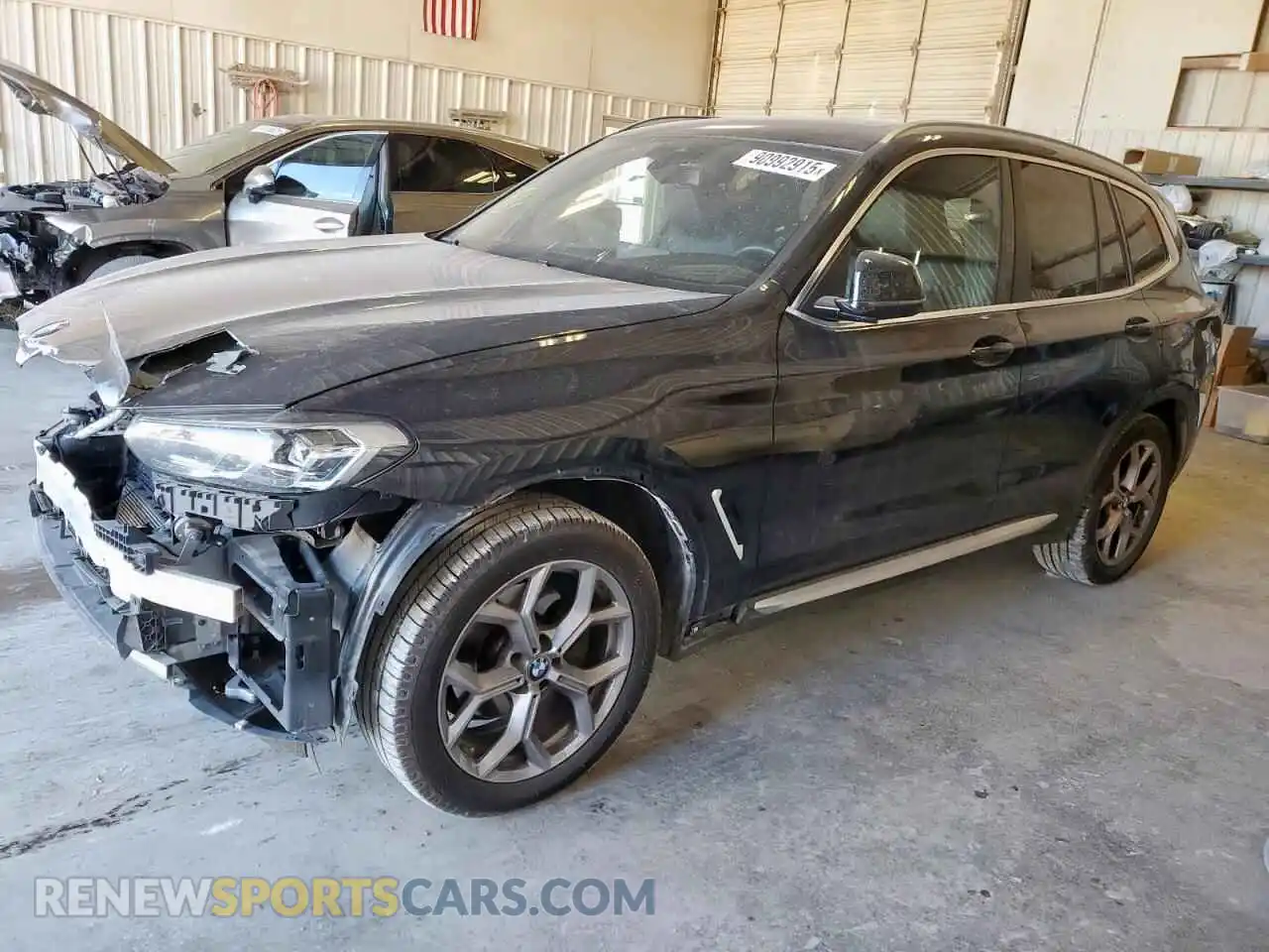 1 Photograph of a damaged car 5UX43DP0XN9K65015 BMW X3 2022