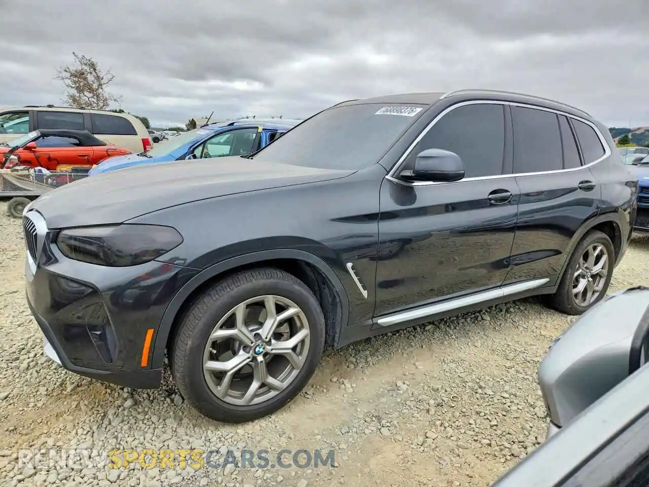 1 Photograph of a damaged car 5UX43DP0XN9N22755 BMW X3 2022