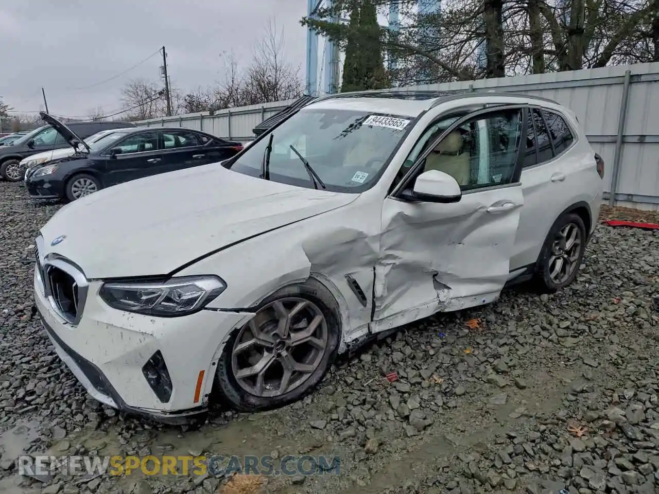 1 Photograph of a damaged car 5UX53DP01N9J36312 BMW X3 2022