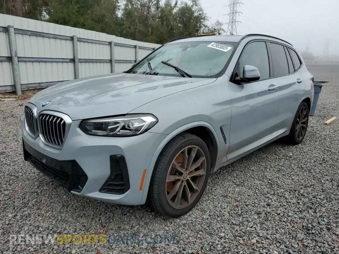 1 Photograph of a damaged car 5UX53DP01N9M16778 BMW X3 2022