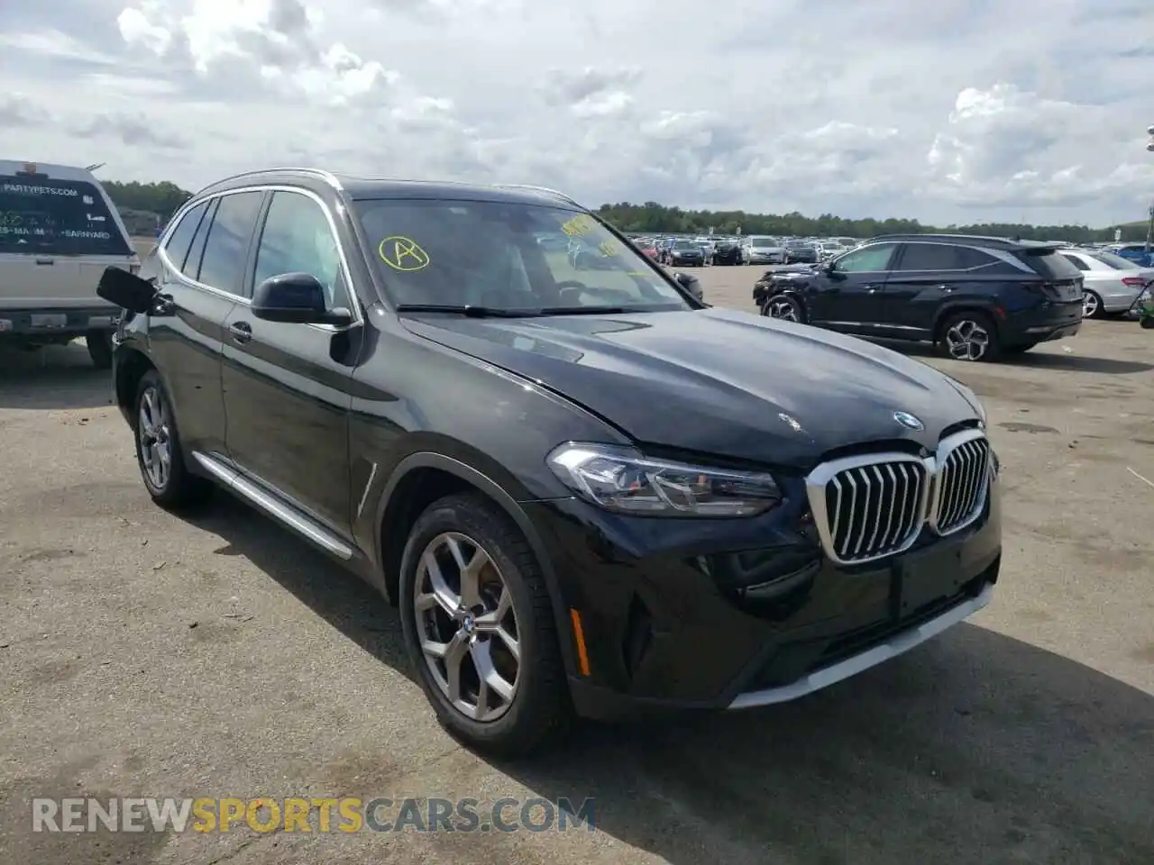 1 Photograph of a damaged car 5UX53DP02N9L12977 BMW X3 2022