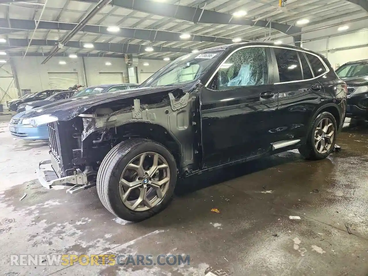 1 Photograph of a damaged car 5UX53DP03N9L44174 BMW X3 2022