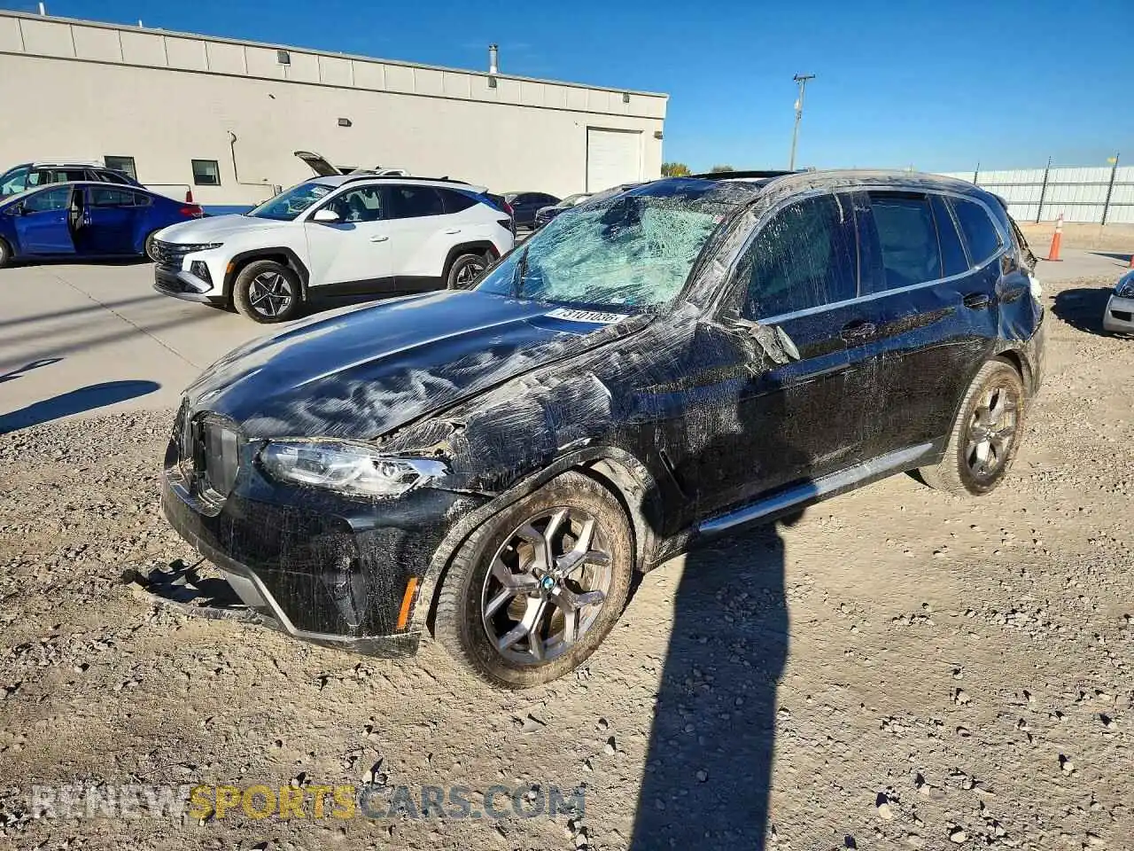 1 Photograph of a damaged car 5UX53DP03N9M21285 BMW X3 2022