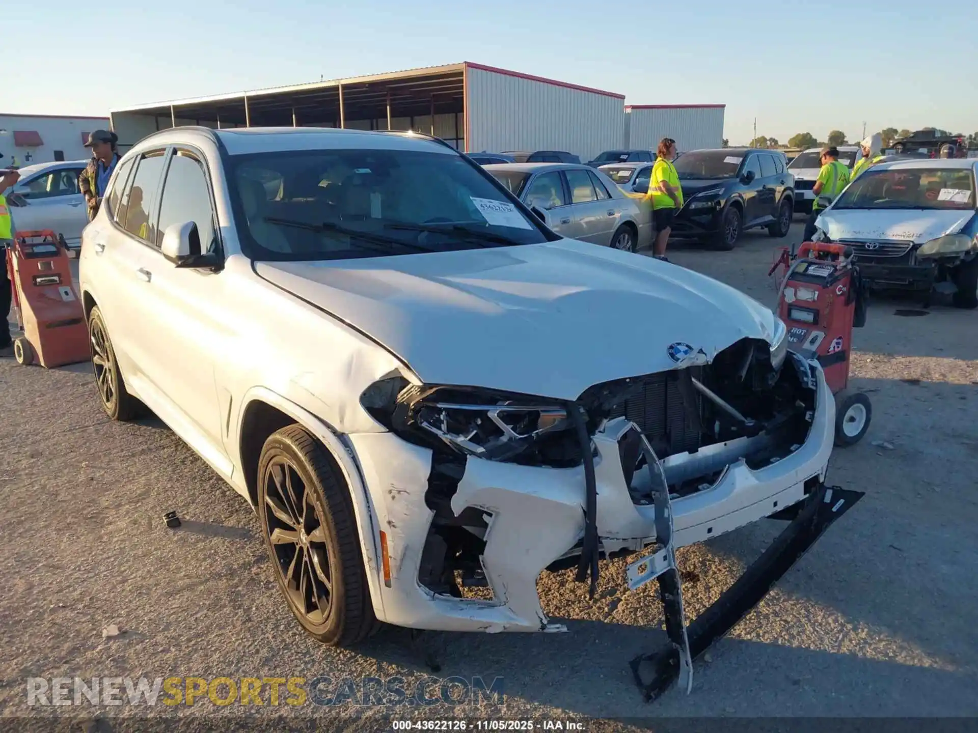 1 Photograph of a damaged car 5UX53DP03N9M67828 BMW X3 2022