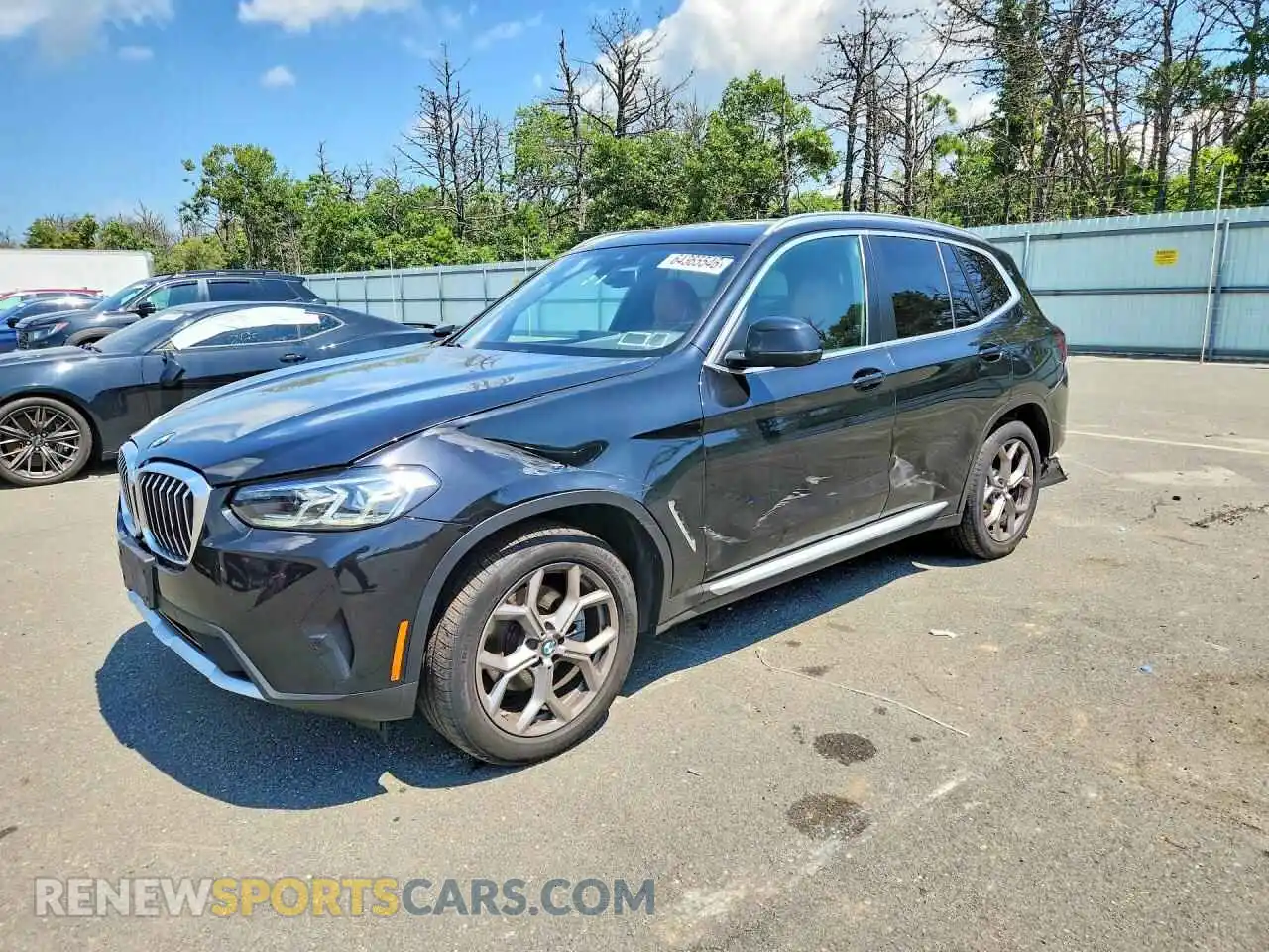 1 Photograph of a damaged car 5UX53DP03N9N05297 BMW X3 2022