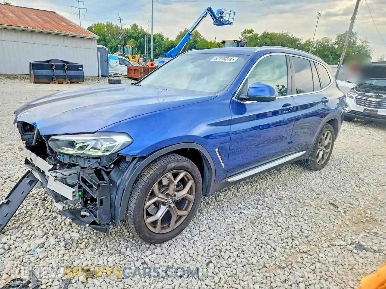 1 Photograph of a damaged car 5UX53DP04N9M92169 BMW X3 2022