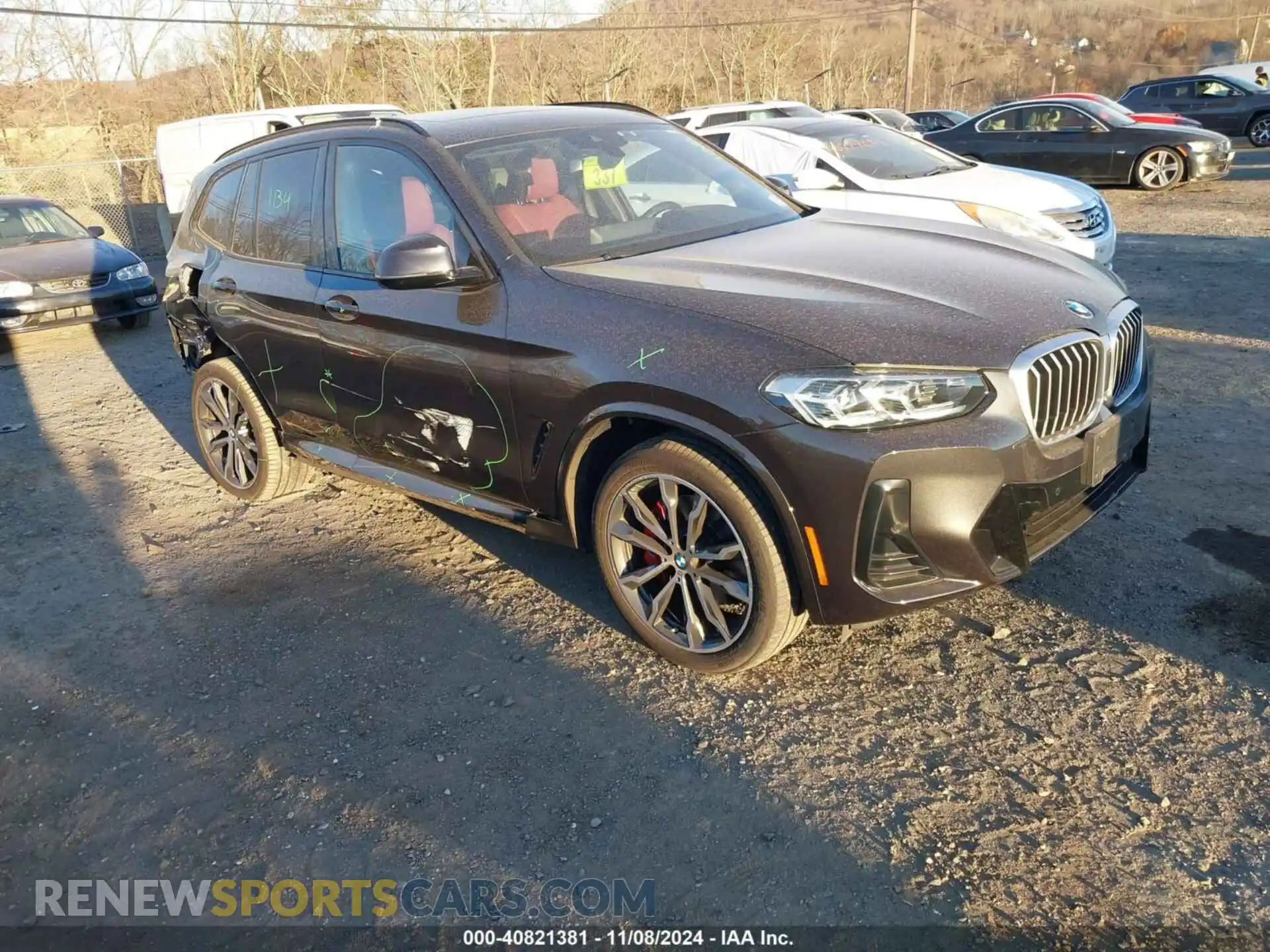 1 Photograph of a damaged car 5UX53DP05N9M67684 BMW X3 2022