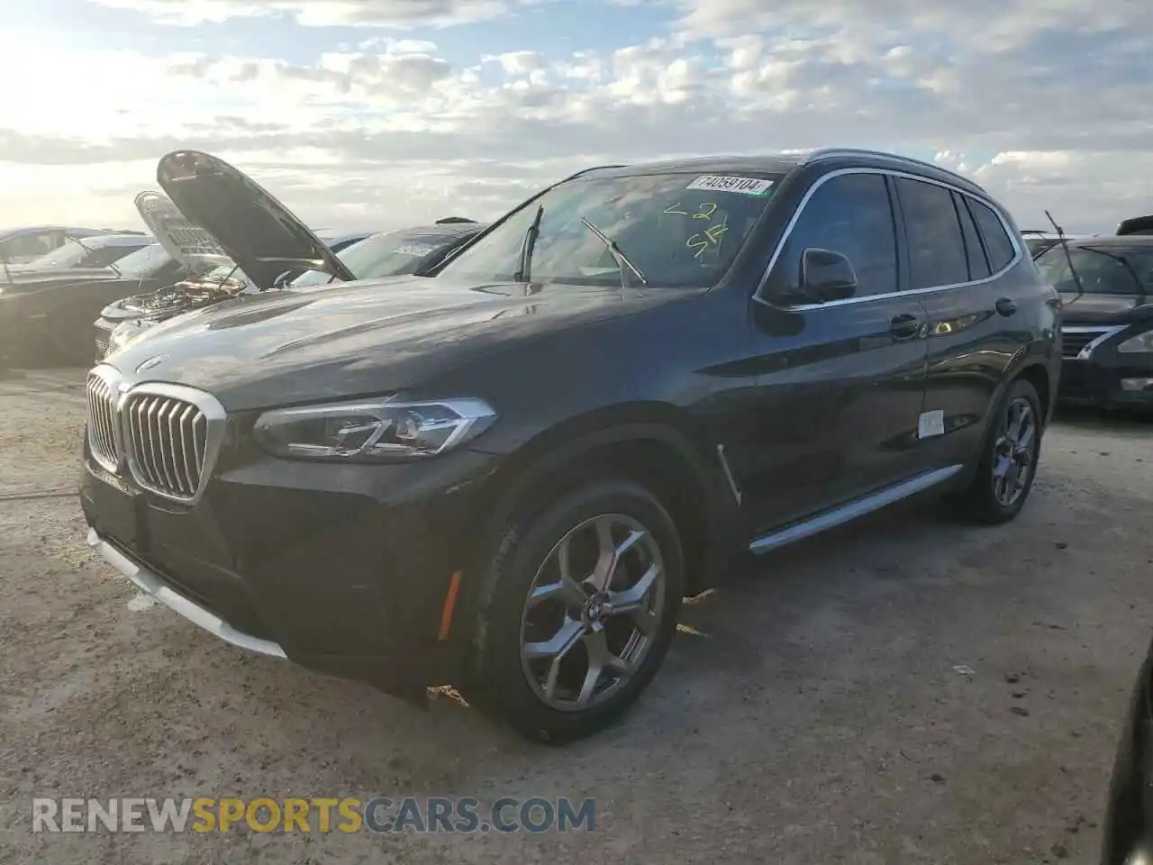 1 Photograph of a damaged car 5UX53DP06N9J29520 BMW X3 2022