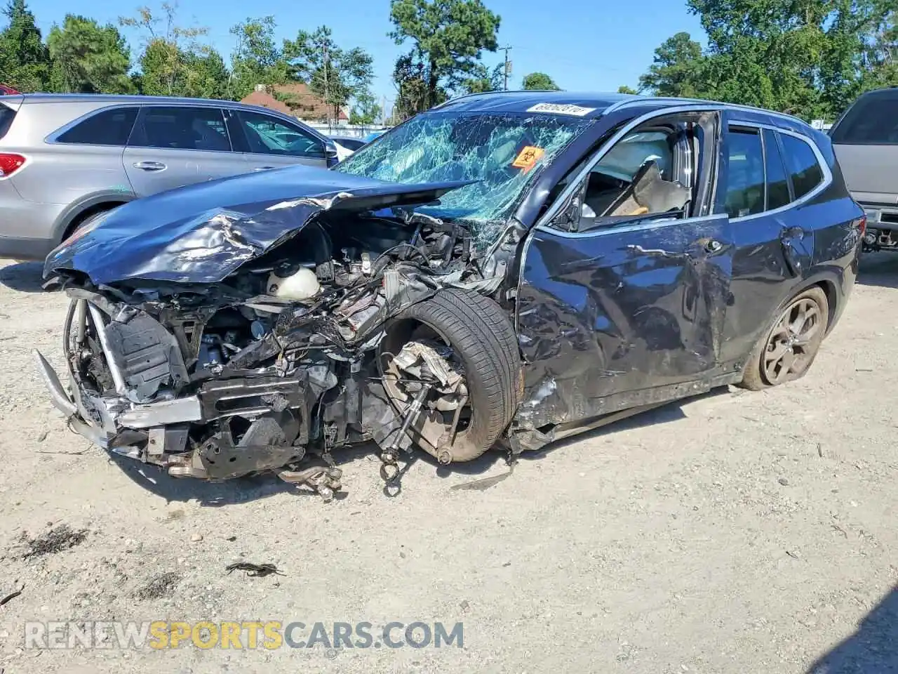 1 Photograph of a damaged car 5UX53DP06N9K69437 BMW X3 2022