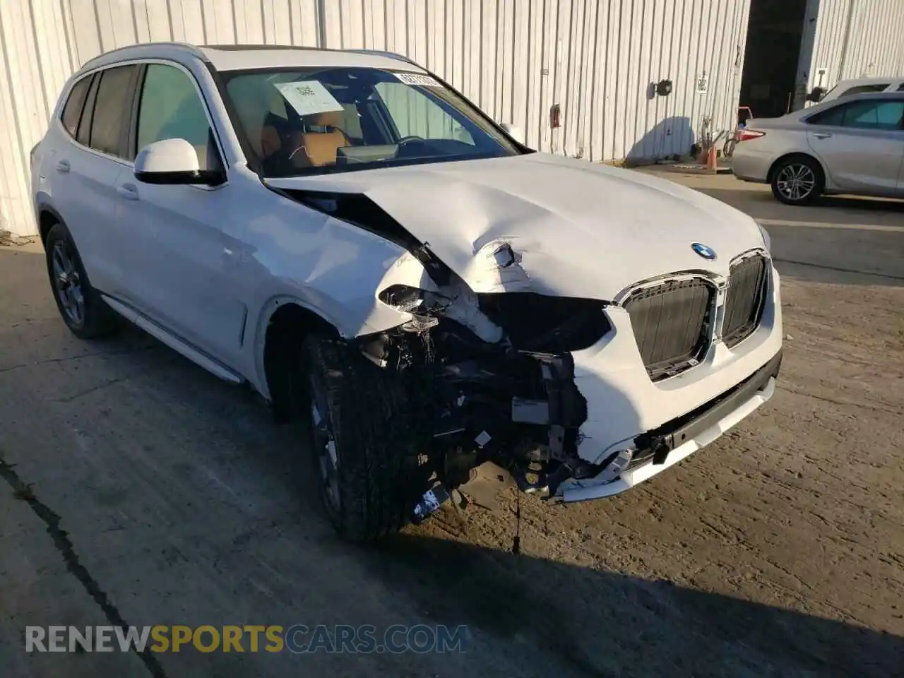 1 Photograph of a damaged car 5UX53DP06N9M07235 BMW X3 2022