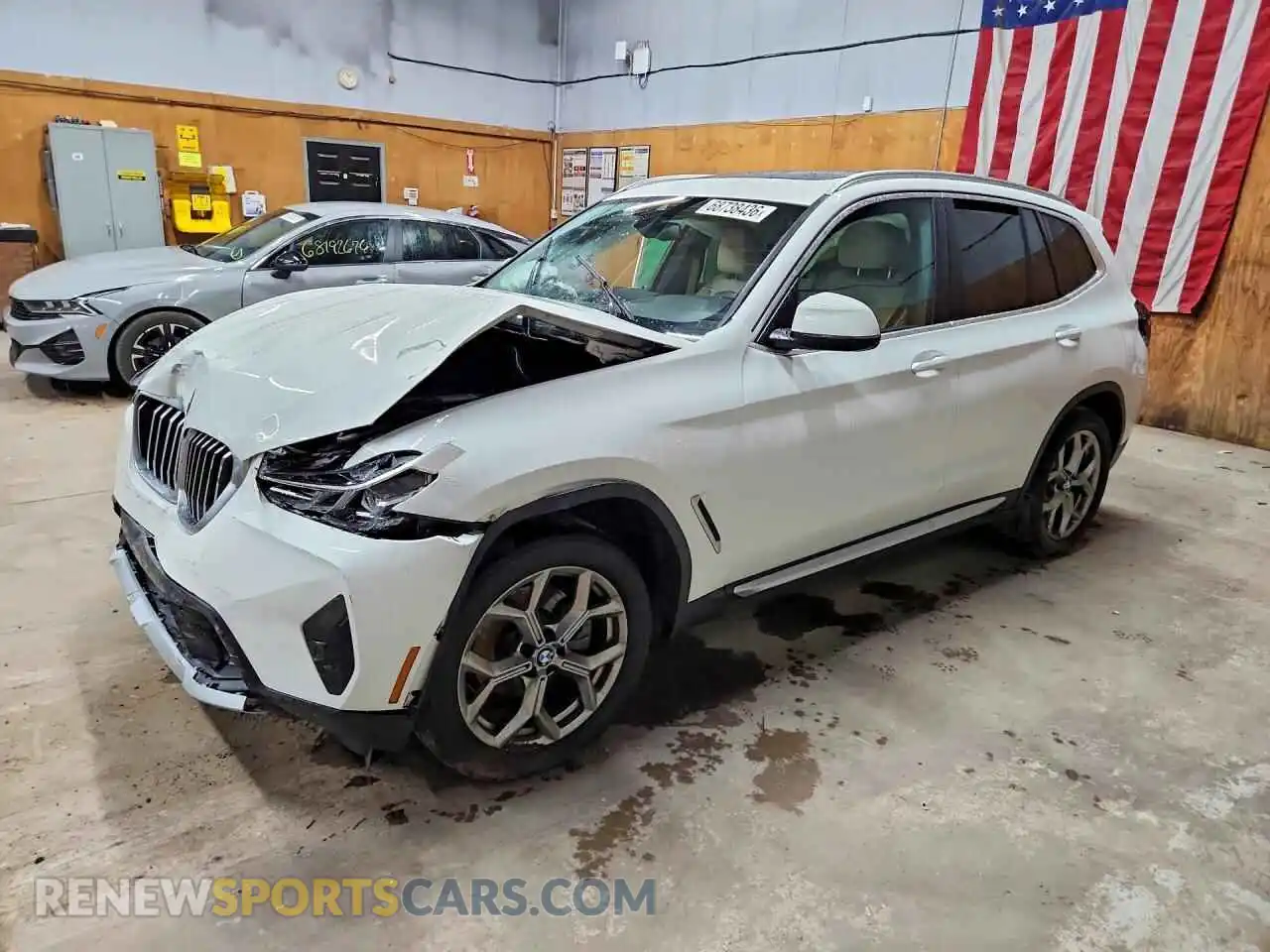 1 Photograph of a damaged car 5UX53DP06N9M92772 BMW X3 2022