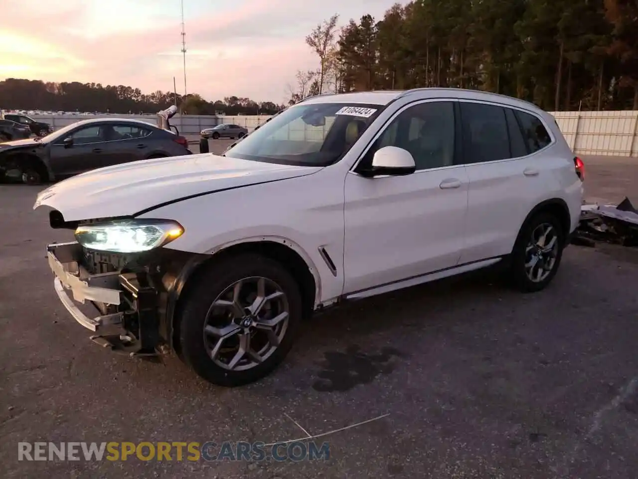 1 Photograph of a damaged car 5UX53DP06N9N05133 BMW X3 2022