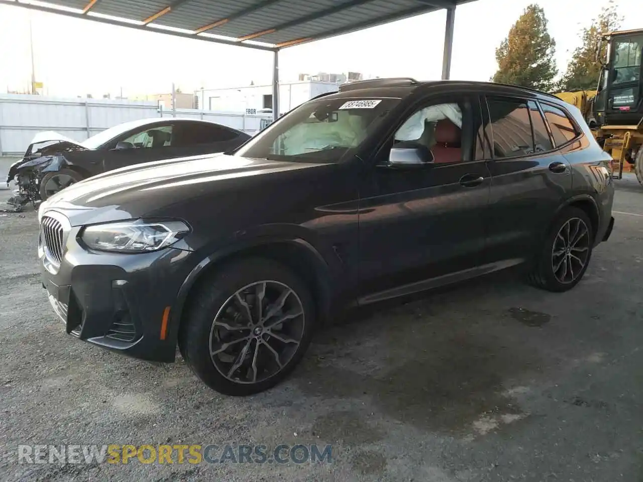 1 Photograph of a damaged car 5UX53DP07N9L96813 BMW X3 2022