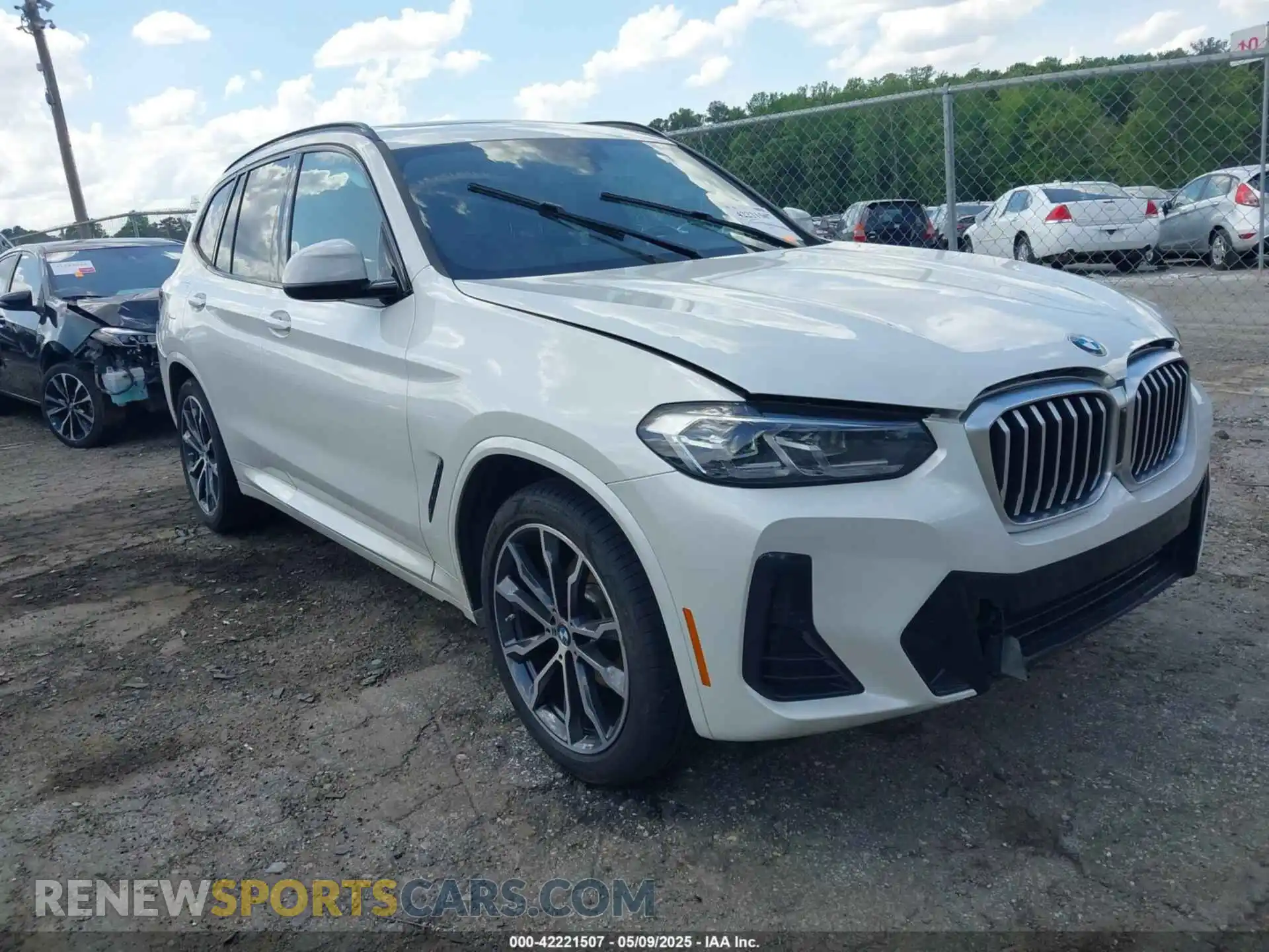 1 Photograph of a damaged car 5UX53DP08N9M12047 BMW X3 2022